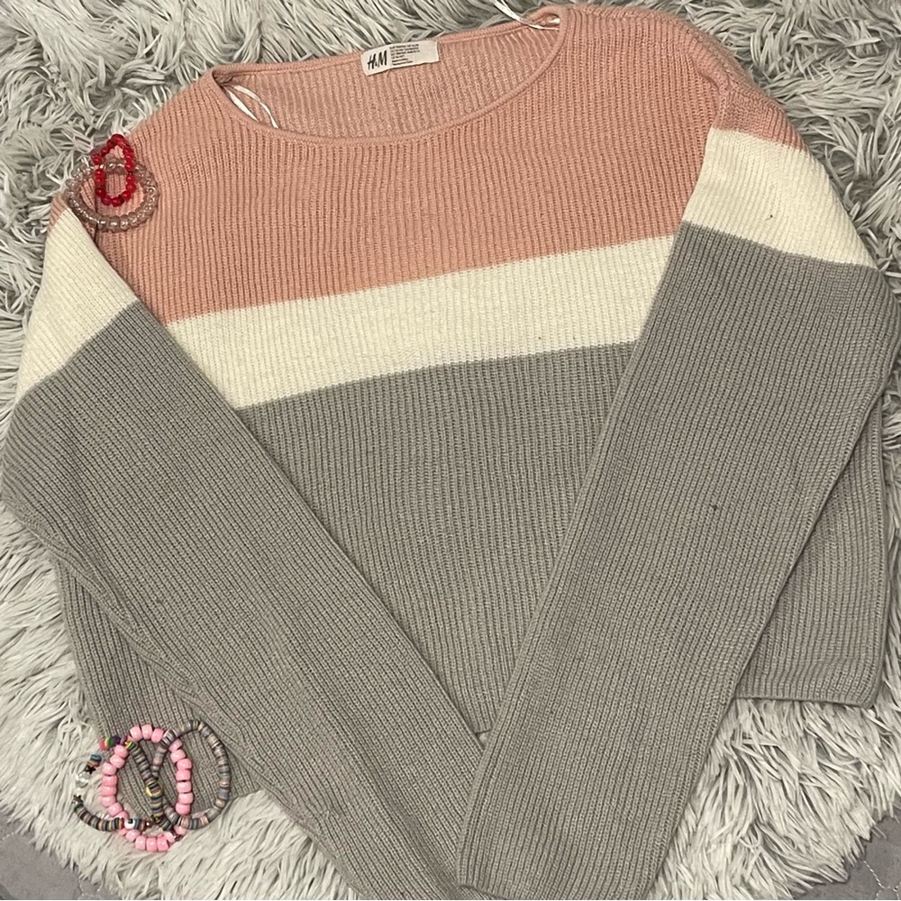 Is good quality. It can fit in a small in women’s size.$10